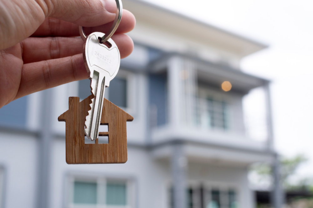landlord-unlocks-house-key-new-home-real-estate-agents-sales-agents