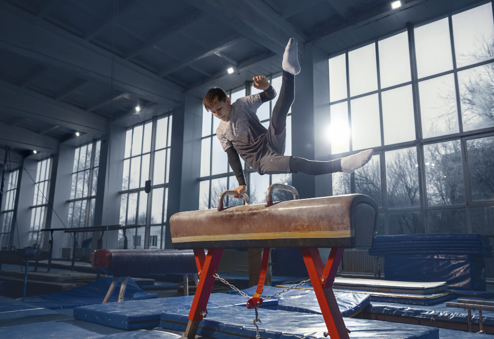 little-male-gymnast-training-gym-flexible-active